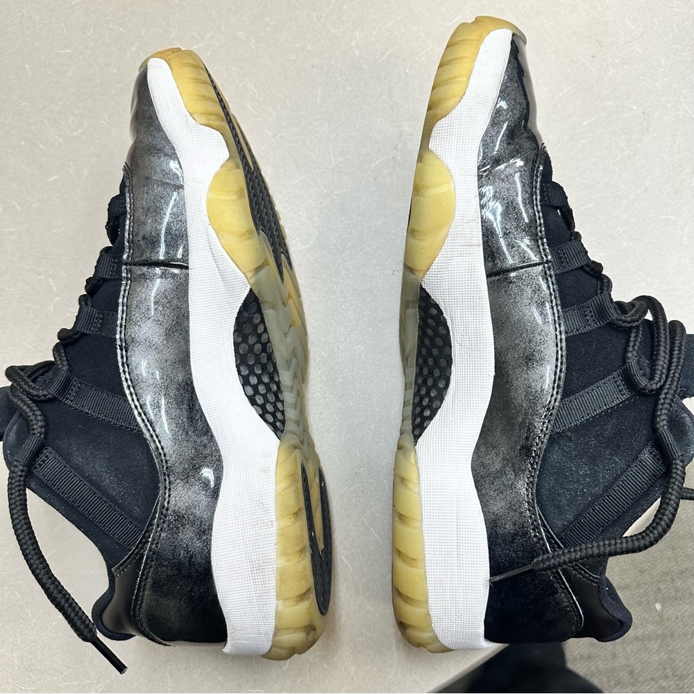 Jordan 11 Black and White Sneakers with Gold Accents - Picture 1 of 10
